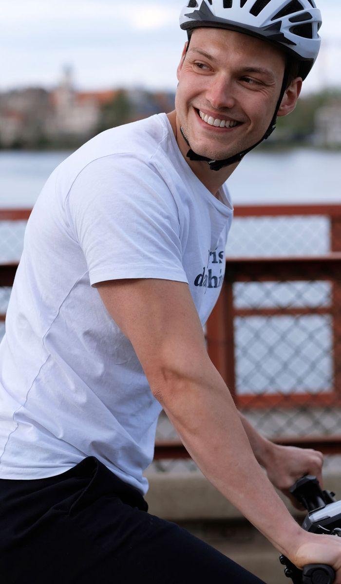 man riding his bike