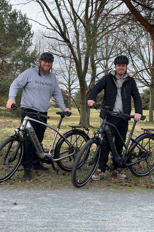Two friends with their bikes