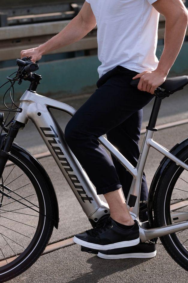 man sitting in his bike